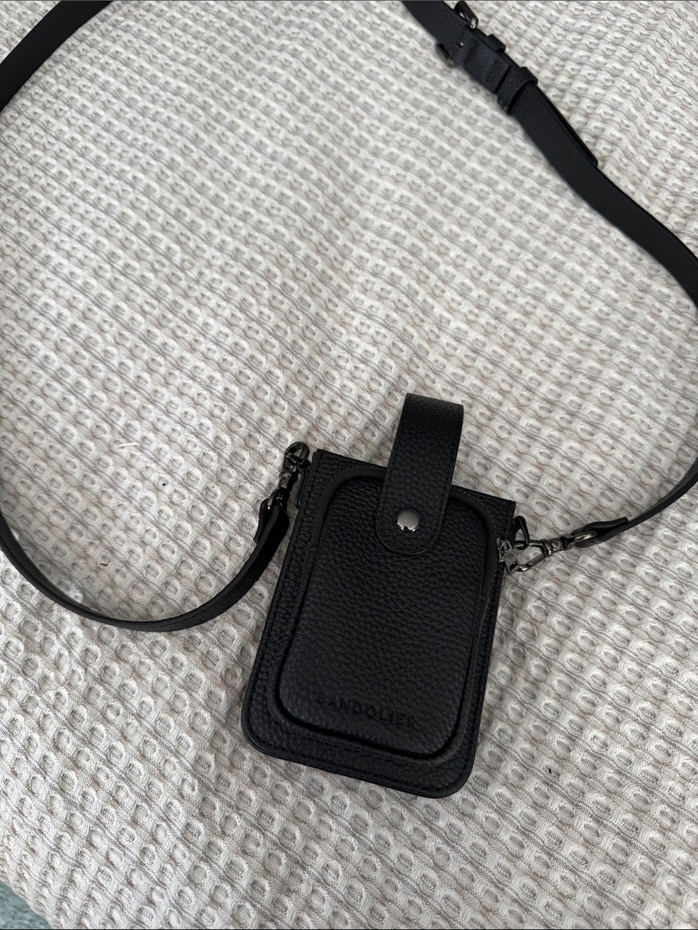 Bandolier crossbody bag for phone, cards and cash. Never used.